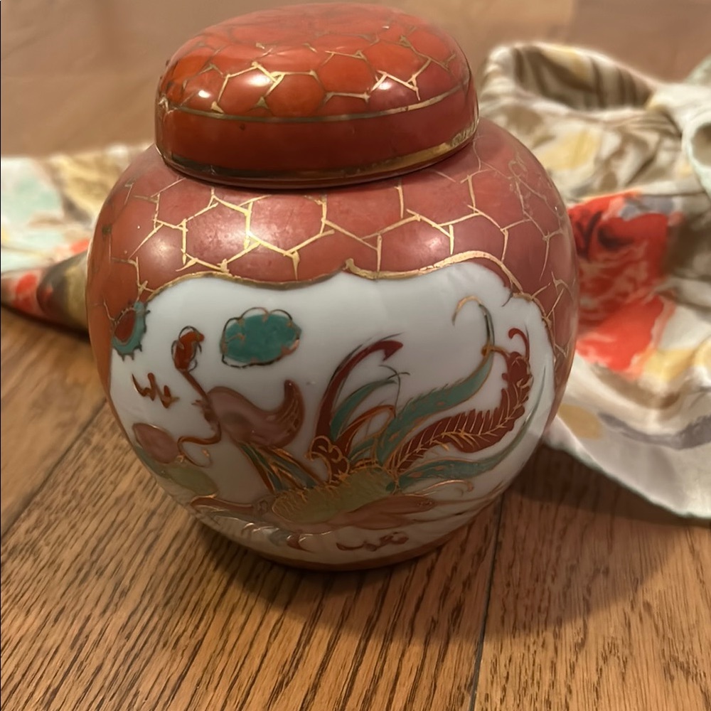 Elegant Red and Gold Ceramic Jar